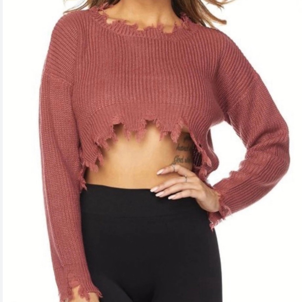 Sweater looks pinker in person